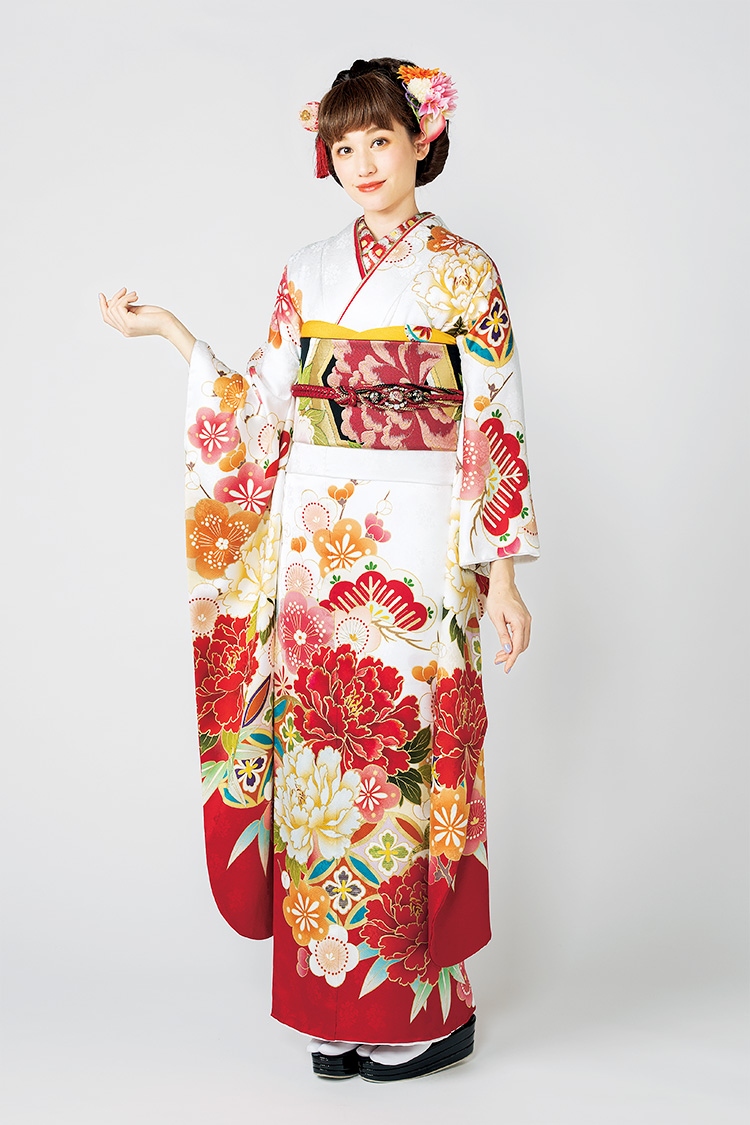 清楚な白に赤い花が浮かびあがる華やぎのある振袖です。